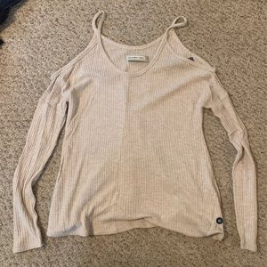 Long sleeve open shoulder shirt. New with tags!